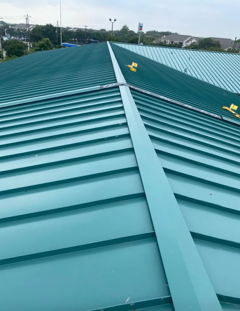 Green commercial metal roof ridge and valley for Metal Roof Repair in Cuyahoga Falls