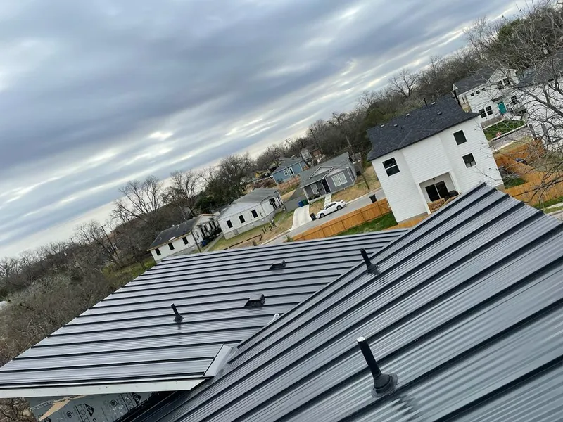 Standing seam metal roof panels with vents for Skylight Repair in Cuyahoga Falls